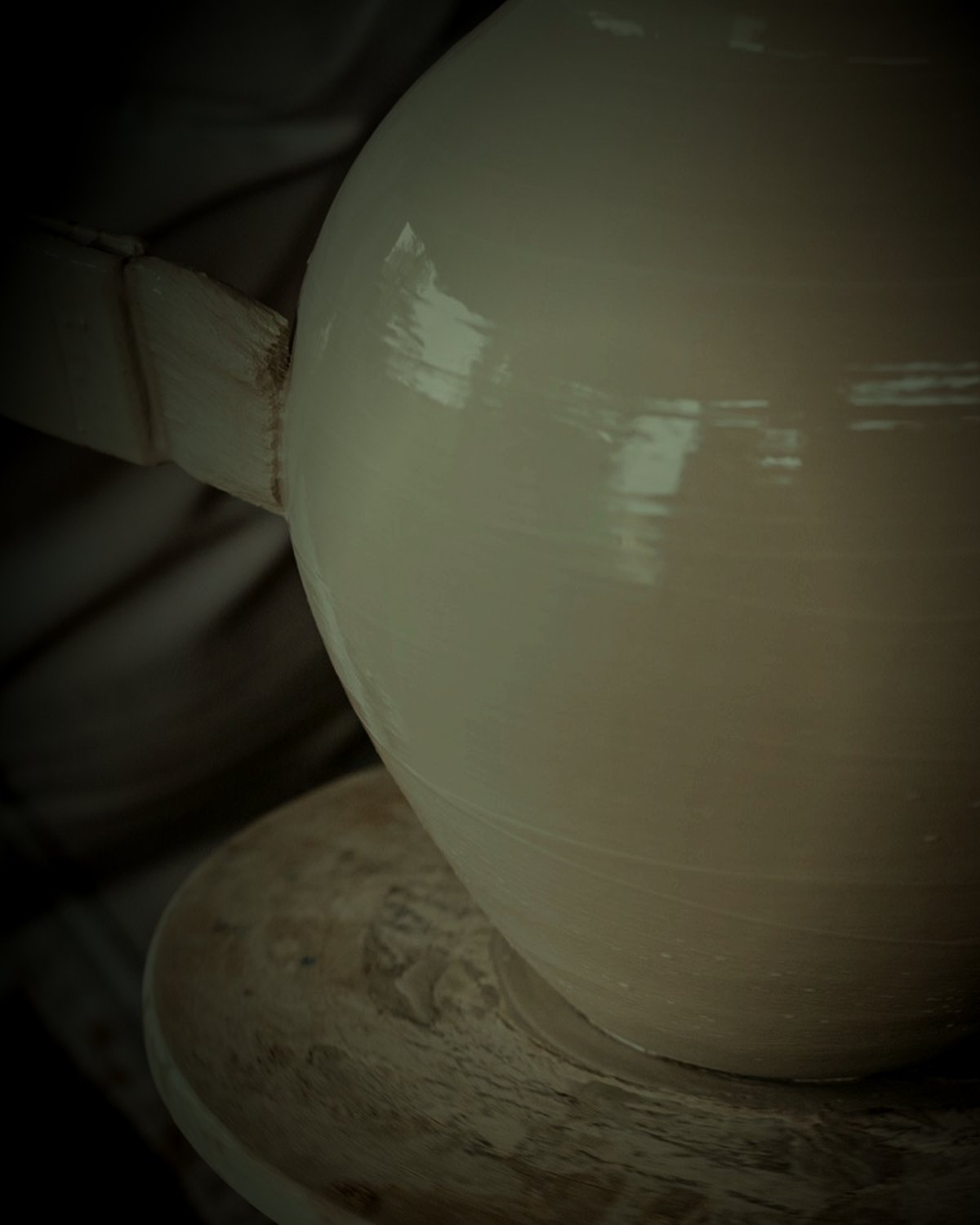 White slip brushed over the parts that must stay pale